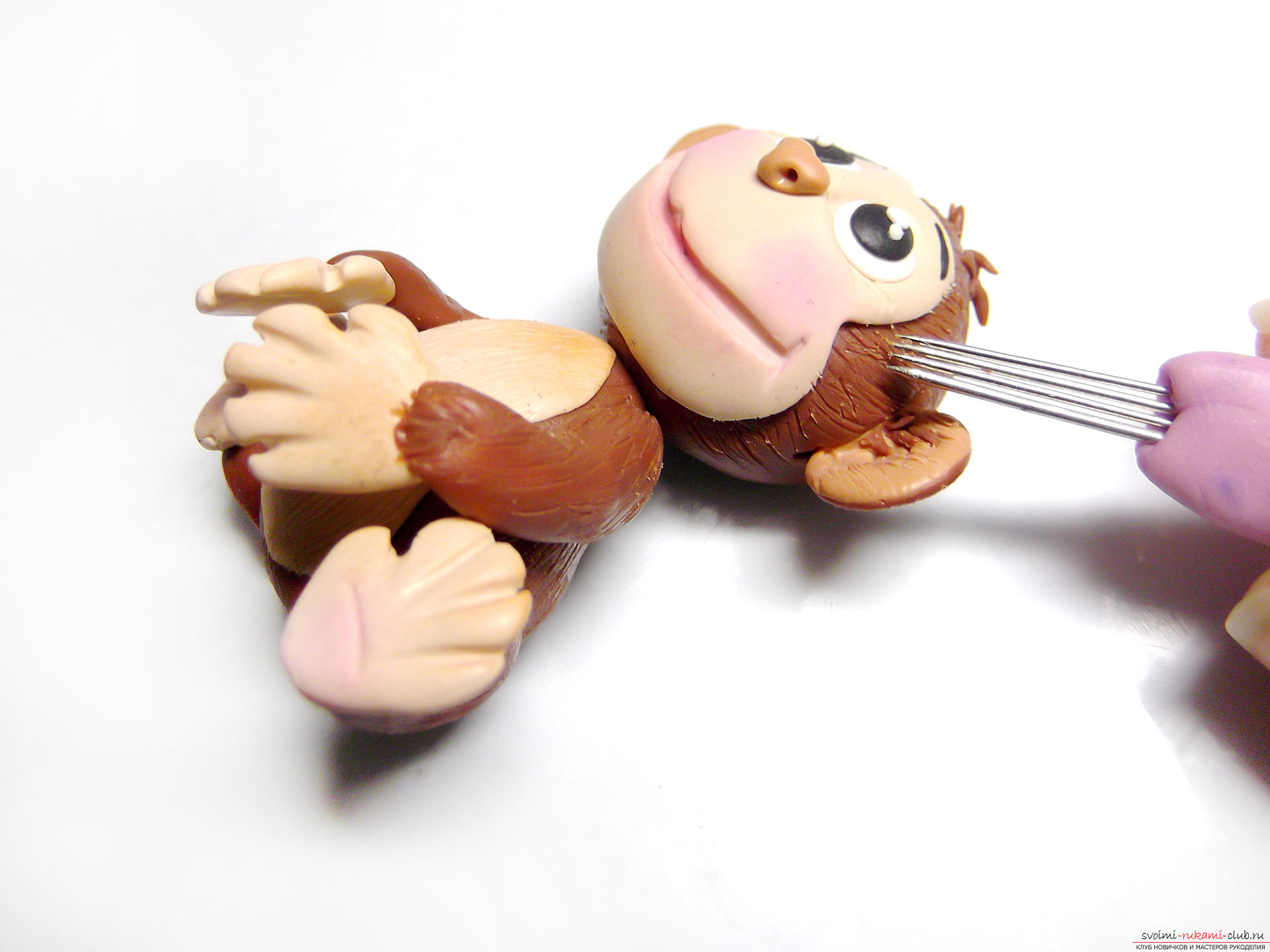Рамка для фото с обезьянкой, созданной своими руками из полимерной глины, очень актуальна в преддверии 2016 года.. Фото №20